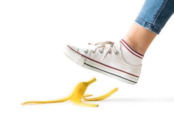 Girl stepping on banana peel 